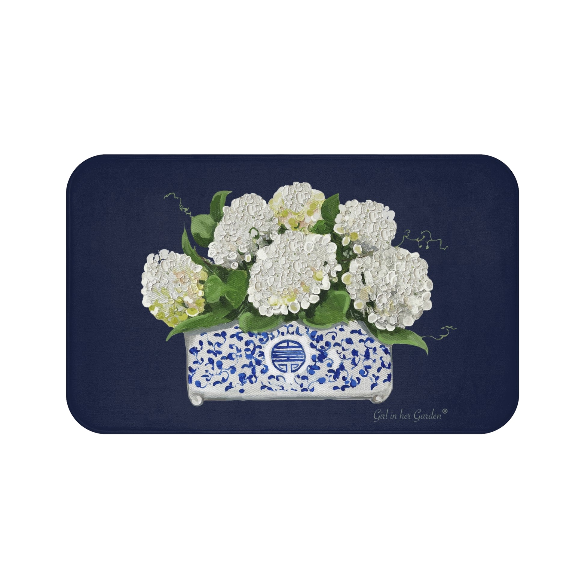 Decorative mat with white flowers in a blue pot on a navy background