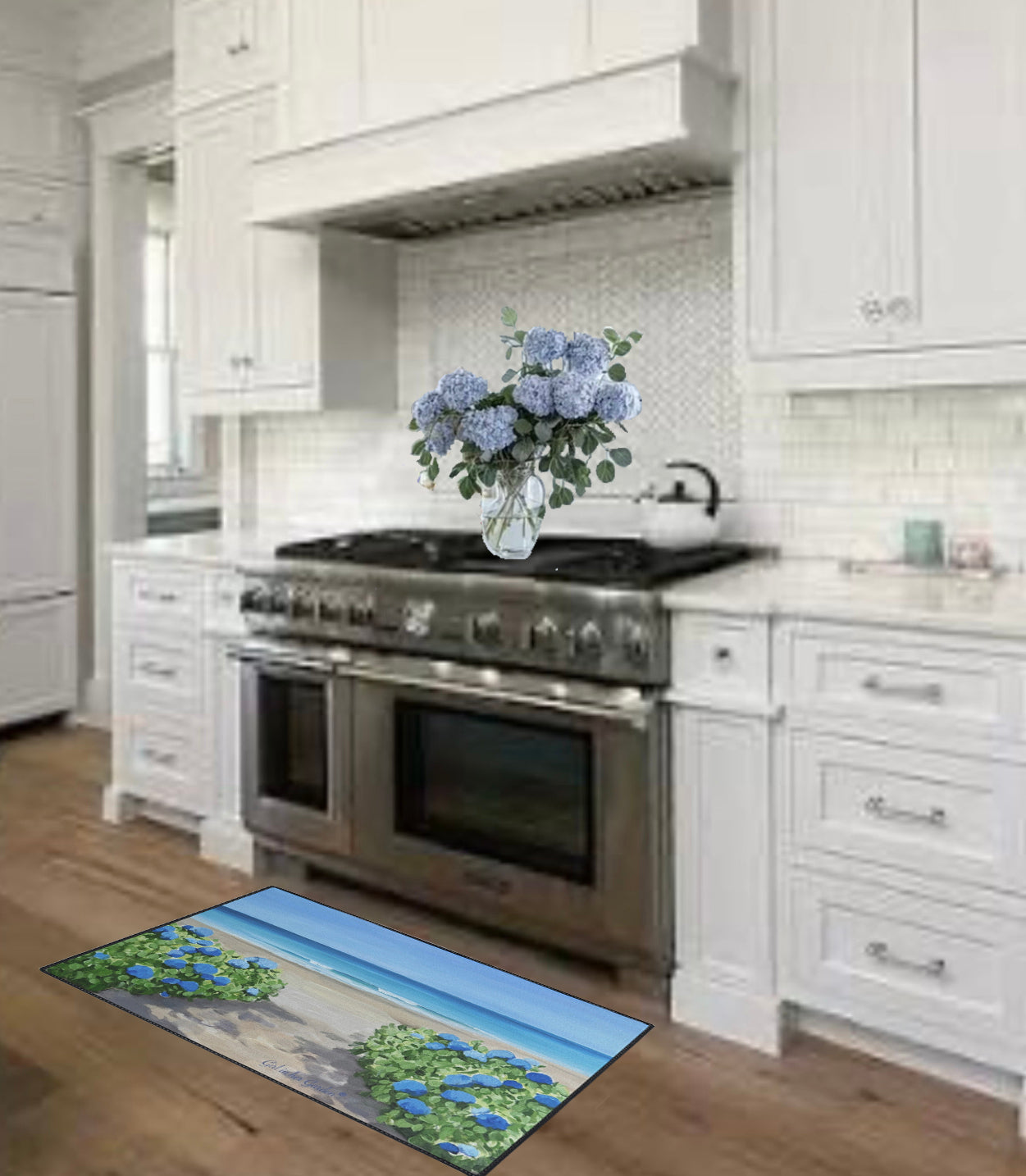 Kitchen with a decorative rug featuring a nature scene on the floor.